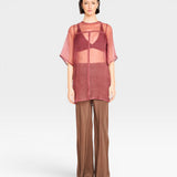 JONES + CO Cocoa silk wide-leg pants with a relaxed fit and high waist. Model wears size S.