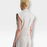 JONES + CO Comeau grey speckled double-breasted vest with peak lapels, shown from the back on a model.