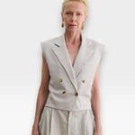 JONES + CO Comeau double-breasted grey speckled suiting vest with peak lapels and horn-look buttons on a model