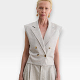 JONES + CO Comeau double-breasted grey speckled suiting vest with peak lapels and horn-look buttons on a model