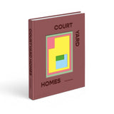 JONES + CO Courtyard Homes hardcover book with a dusty rose cover and abstract geometric design