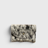 JONES + CO salt and pepper cowhide cardholder with a gold snap button closure on a neutral background