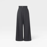 JONES + CO black organic cotton high-waisted wide-leg pleated Coxsone pants.