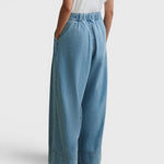 JONES + CO Coxsone wide-leg pleated trousers in celeste blue organic cotton with an elasticated back waistband.