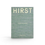 JONES + CO Damien Hirst Cherry Blossoms exhibition book with a textured green linen cover and white typography.