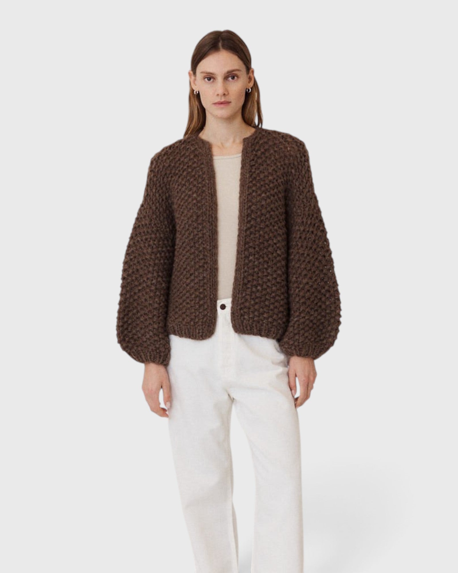 JONES + CO dark brown chunky alpaca bomber cardigan with a textured pearl knit pattern worn by a model.
