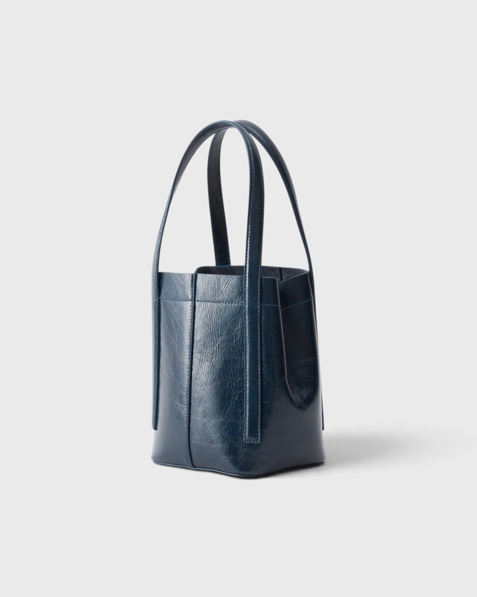 JONES + CO Bucket Tool bag in dark indigo lustre leather with vertical paneling and sturdy elongated handles