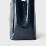 JONES + CO Bucket Tool bag in dark indigo lustre leather with vertical paneling and sturdy elongated handles