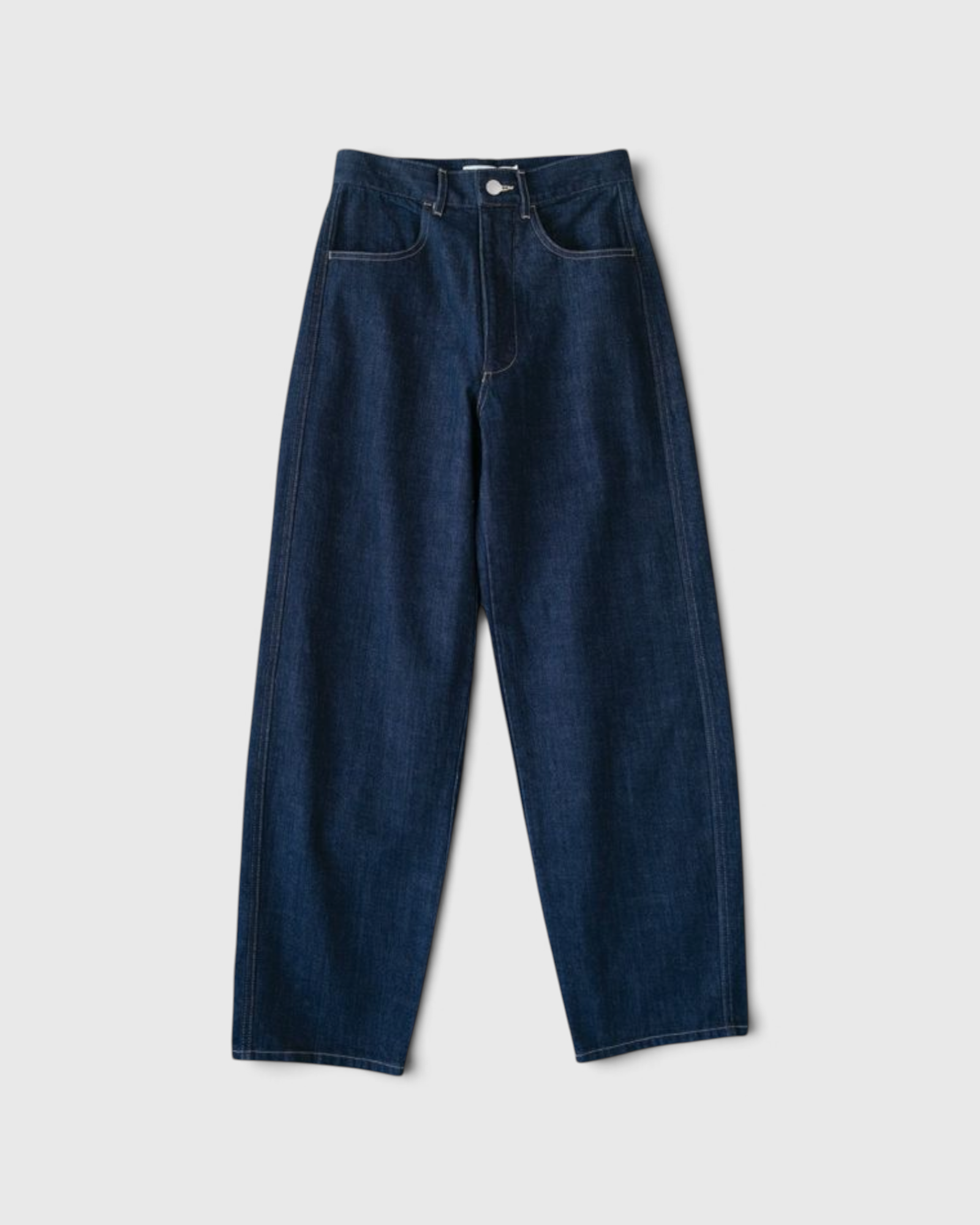 JONES + CO dark indigo high-rise relaxed-fit jeans with outseam piecing and a rounded leg silhouette.