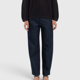 JONES + CO dark indigo high-rise relaxed-fit jeans with outseam piecing and a rounded leg silhouette