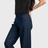 JONES + CO dark indigo high-rise relaxed-fit jeans with outseam piecing and a rounded leg silhouette