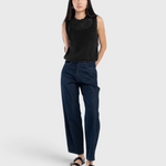 JONES + CO dark indigo panel jeans with a high-rise, relaxed fit and rounded leg shape worn by a model.