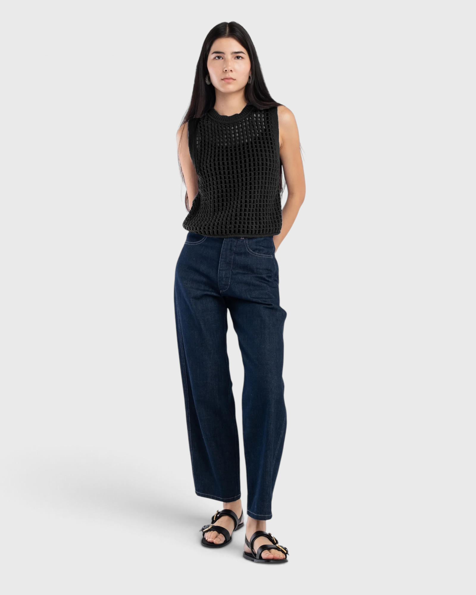 JONES + CO dark indigo panel jeans with a high-rise, relaxed fit and rounded leg shape worn by a model.