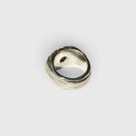 JONES + CO Dean ring in .925 sterling silver featuring a sculptural band and a blue star sapphire gemstone