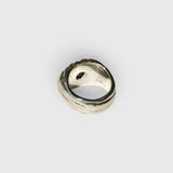JONES + CO Dean ring in .925 sterling silver featuring a sculptural band and a blue star sapphire gemstone
