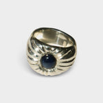 JONES + CO Dean ring in .925 sterling silver featuring a bold, sculptural design with a blue star sapphire center.