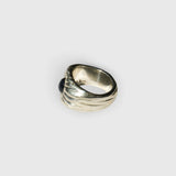 JONES + CO Dean sculptural sterling silver ring featuring a blue star sapphire gemstone