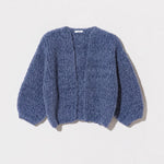 JONES + CO denim blue bomber cardigan in a soft, chunky knit alpaca and wool blend with a relaxed fit.
