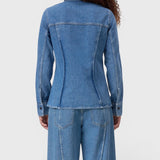 JONES + CO mid blue denim shirt with curved back seaming and long sleeves on a model