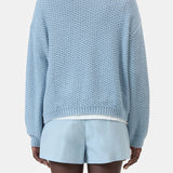 JONES + CO dove blue knitted jersey with 3D effect stripe pattern, made from organic cotton. Regular fit, long sleeves, ribbed cuffs.