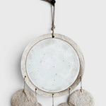 JONES + CO Dreamweaver wall hanging in Full Moon White featuring stoneware, porcelain, and natural hemp rope details.