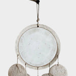 JONES + CO Dreamweaver wall hanging in Full Moon White featuring stoneware, porcelain, and natural hemp rope details.
