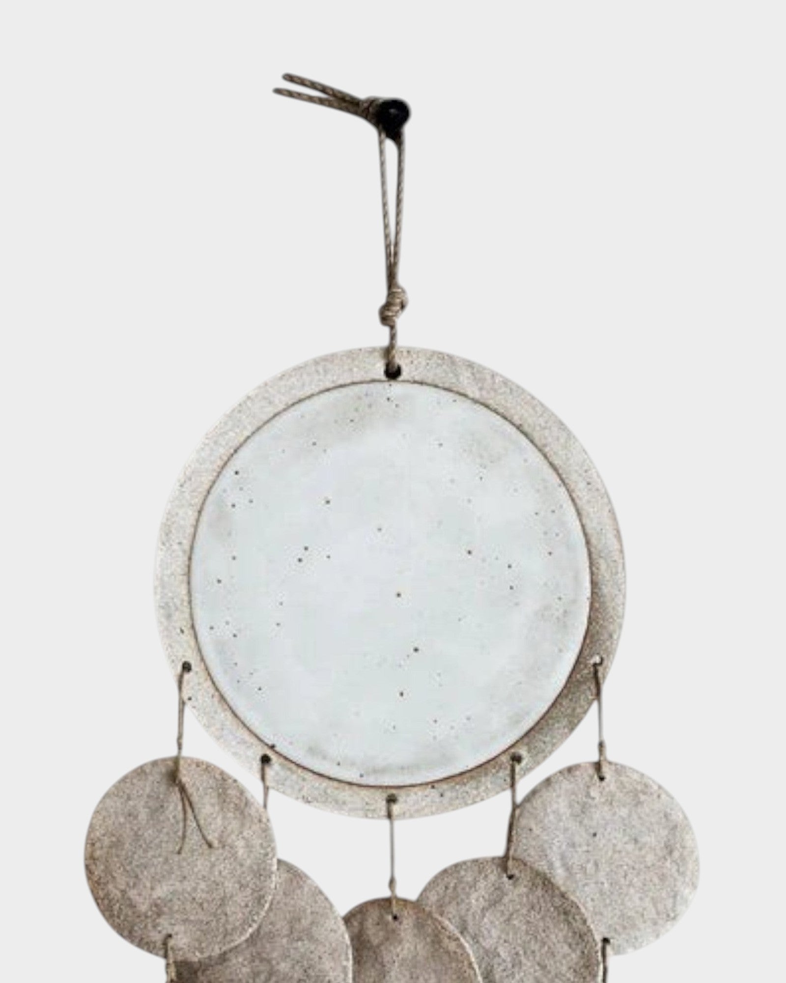 JONES + CO Dreamweaver wall hanging in Full Moon White featuring stoneware, porcelain, and natural hemp rope details.