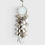 JONES + CO Dreamweaver wall hanging in Full Moon White, featuring stoneware and porcelain discs on hemp rope.