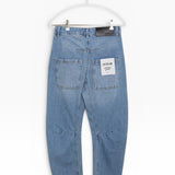 JONES + CO Easton Jean in malibu wash denim. Relaxed fit jeans with a straight leg and unique paneling detail.