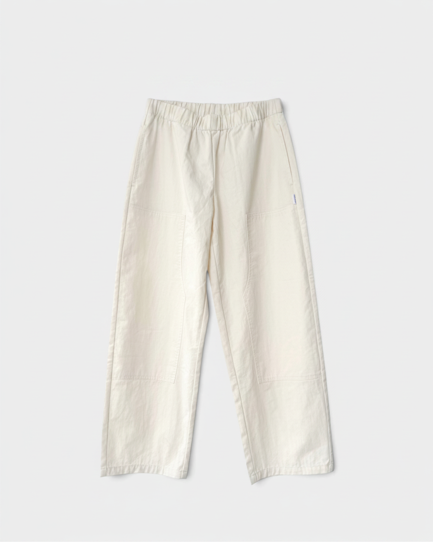 JONES + CO ecru Gardener's Pants in lightweight cotton-nylon with an elastic waist and carpenter-style front patches.