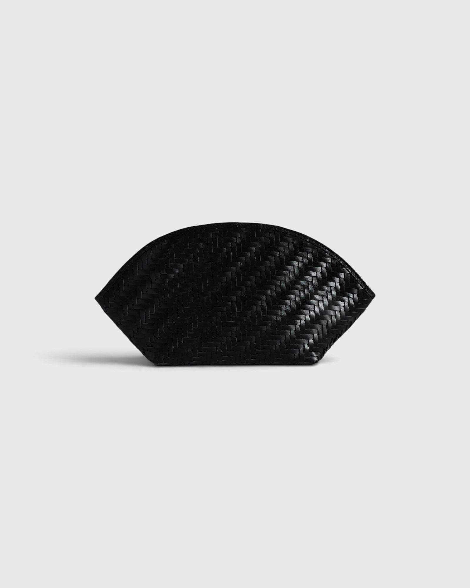 JONES + CO Elin black calfskin pouch featuring a sophisticated braided woven pattern and a secure zip closure.