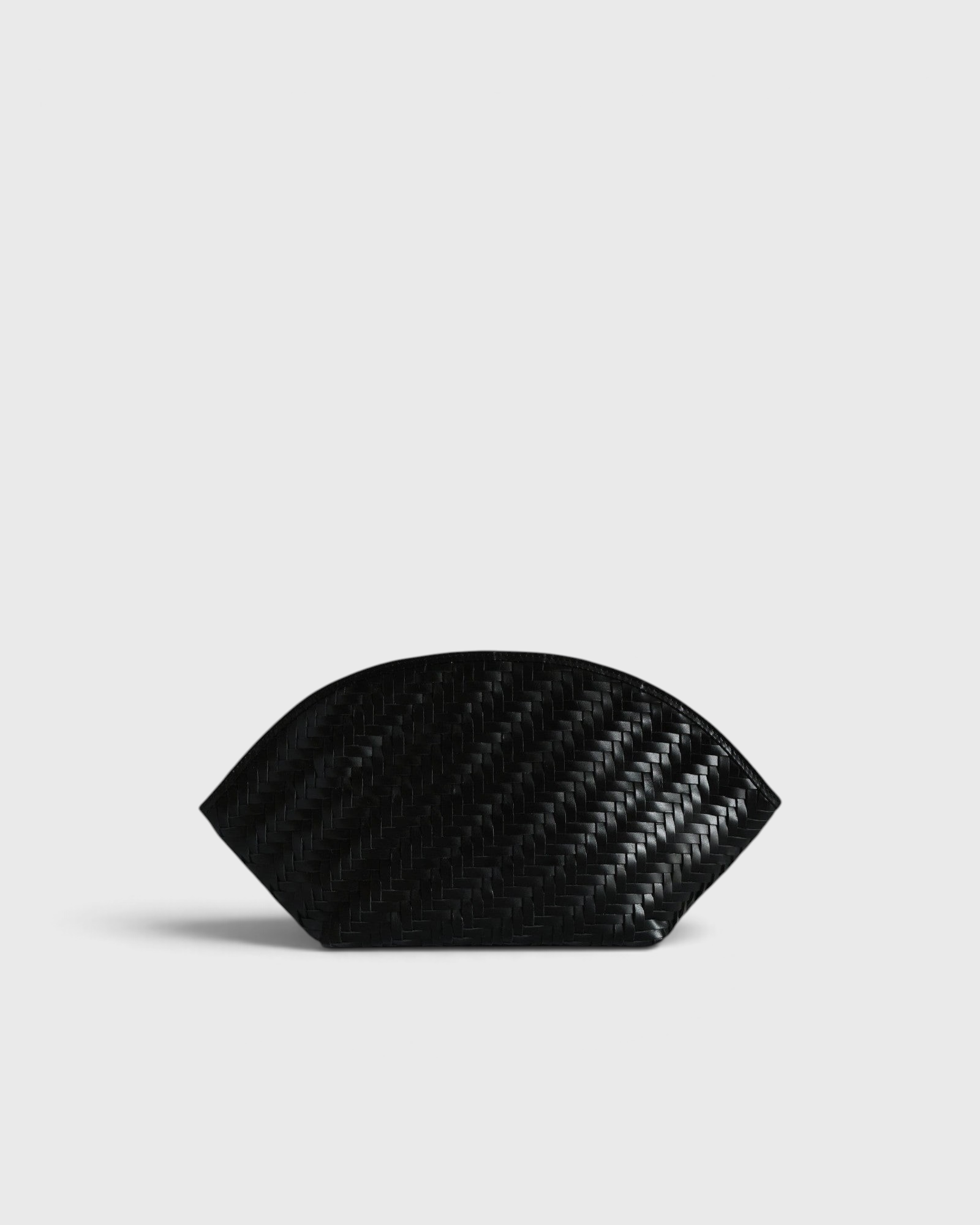JONES + CO Elin black calfskin pouch featuring a sophisticated braided woven pattern and a secure zip closure.