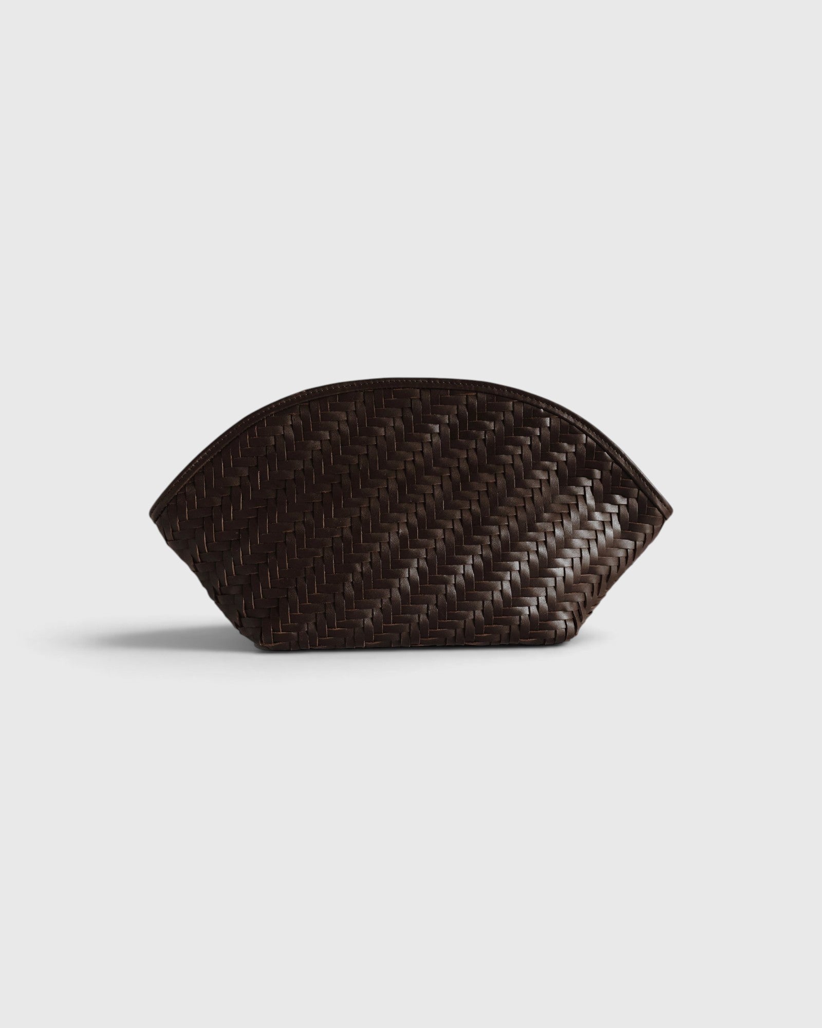 JONES + CO Elin Pouch in espresso brown braided calfskin with a zip closure and woven texture.