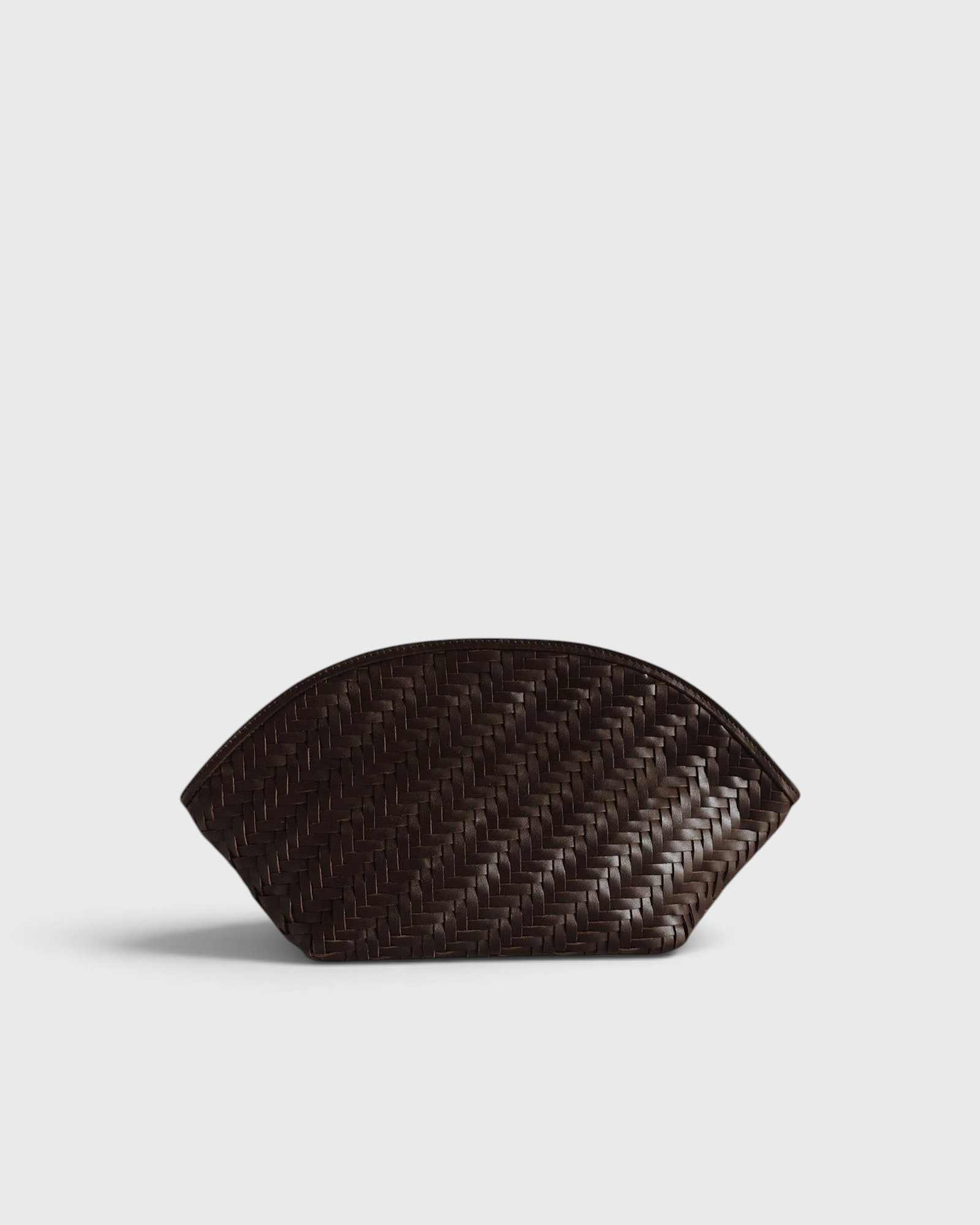 JONES + CO Elin Pouch in espresso brown braided calfskin with a zip closure and woven texture.