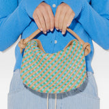JONES + CO Elis Mini Crescent Bag in woven cognac calf leather with blue and green checkered pattern. Features knotted straps.