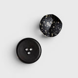 JONES + CO UME Studio Erode Soap in Daily Detox with activated charcoal and a matching black Bouton soap dish plate.