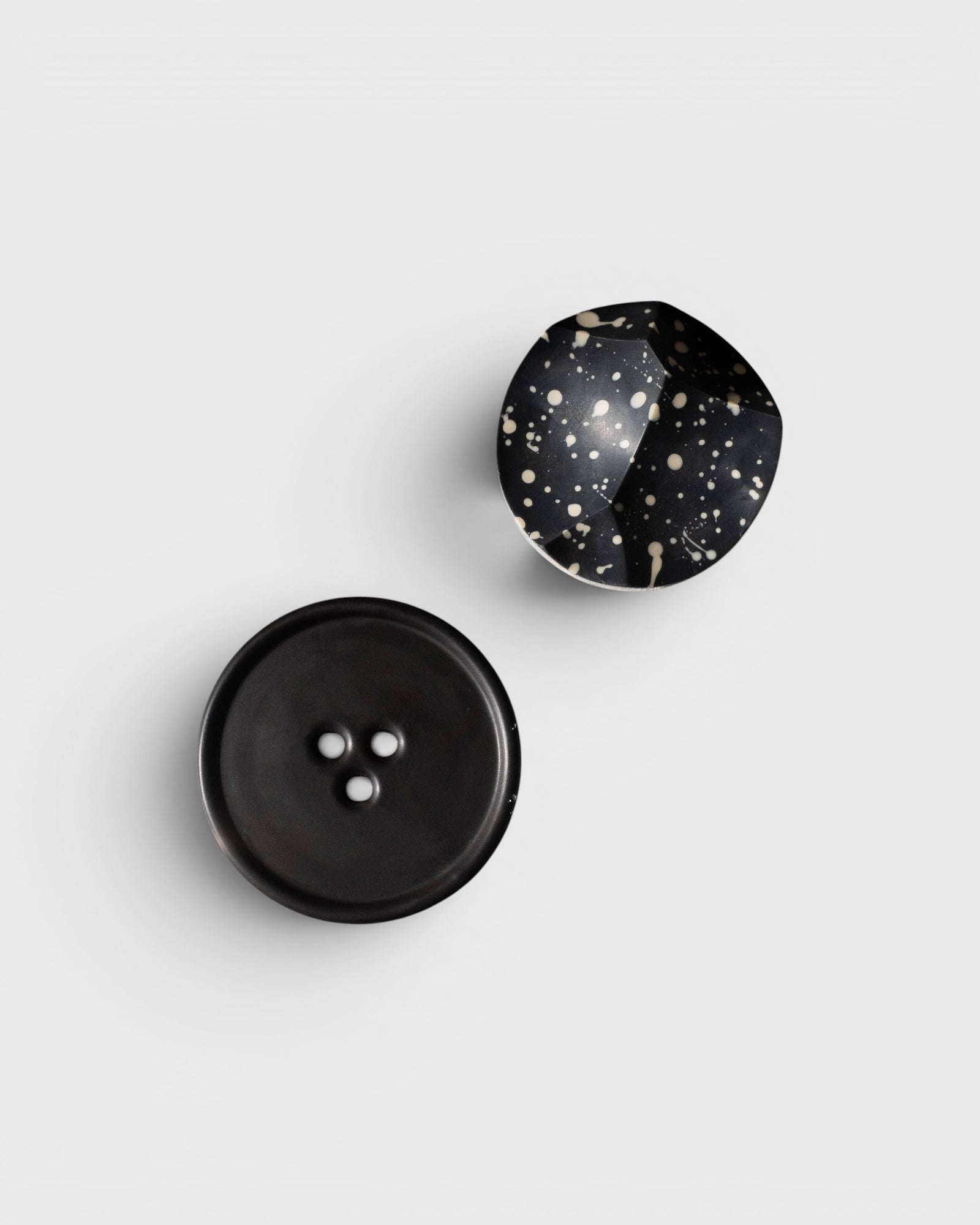 JONES + CO UME Studio Erode Soap in Daily Detox with activated charcoal and a matching black Bouton soap dish plate.