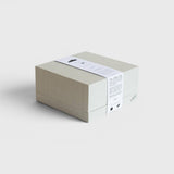 JONES + CO Erode Soap Daily Detox in a minimalist grey paper box with a white product information band