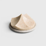 JONES + CO Erode Soap in Linden, a hand-poured botanical soap with a unique mountain shape on a matching stone plate.