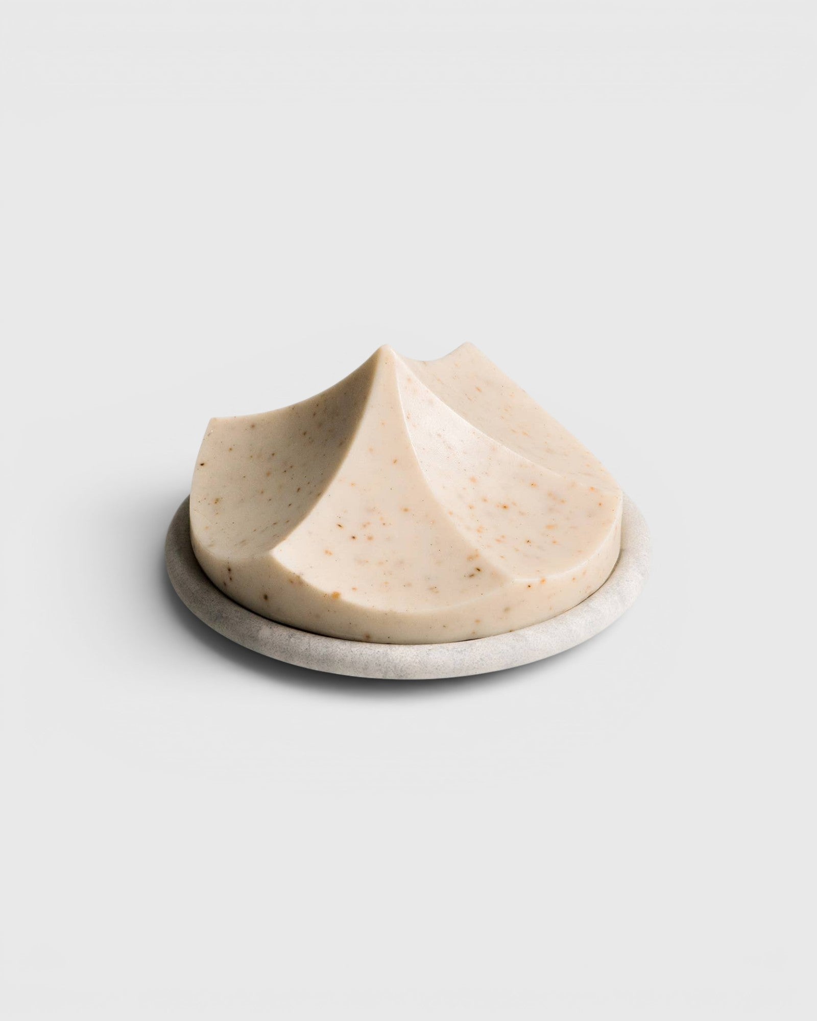 JONES + CO Erode Soap in Linden, a hand-poured botanical soap with a unique mountain shape on a matching stone plate.