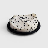 JONES + CO UME Studio Erode Soap in white with black speckles, featuring a sculptural shape on a black base.