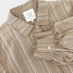 JONES + CO Esme Blouse in biscuit striped cotton poplin. Features lined puff sleeves, pearl buttons, and a covered placket.