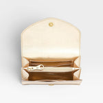 JONES + CO Esperia Medium Wallet in metallic platino leather with snap closure, zip coin pocket, card slots, and ID pockets.