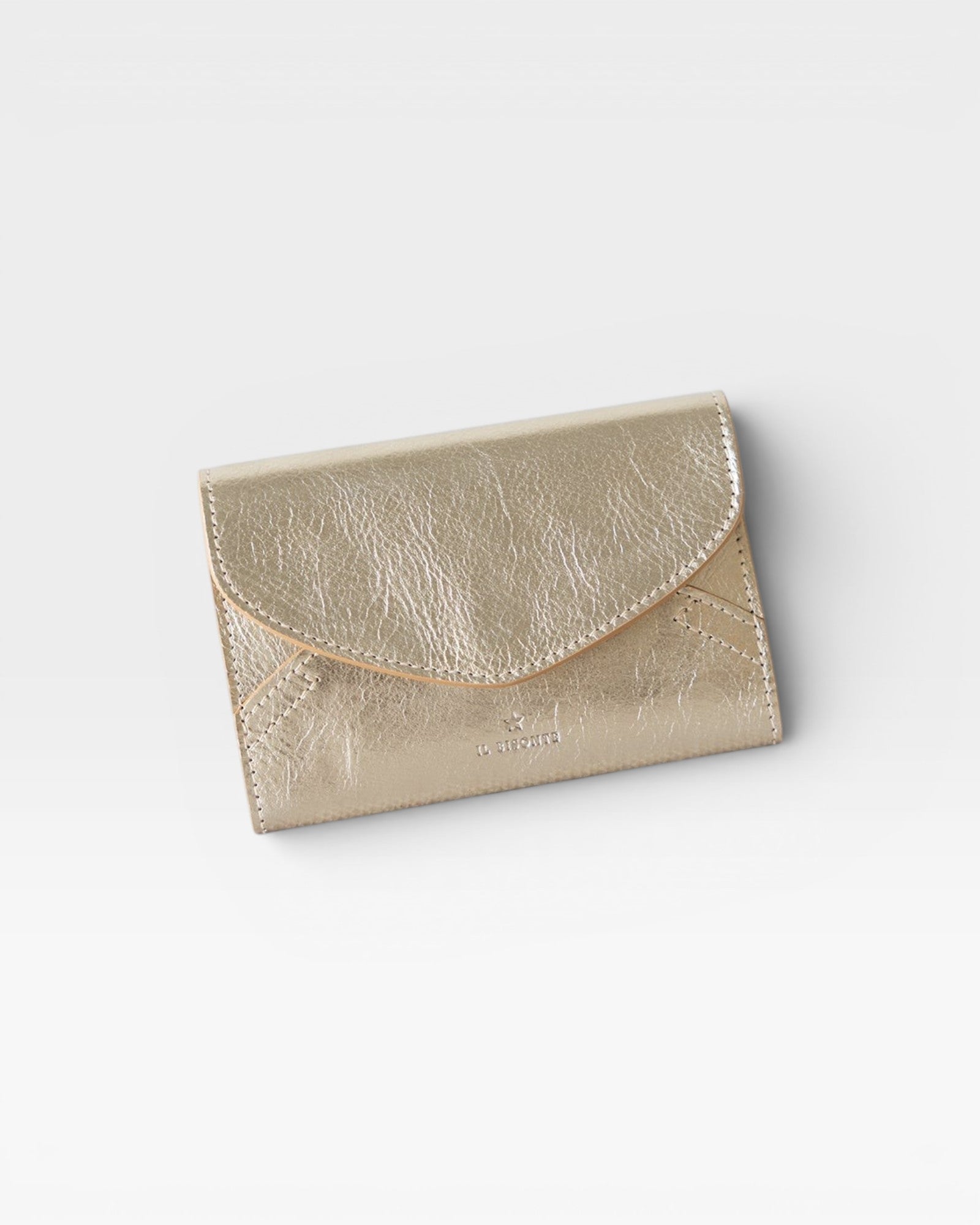 JONES + CO Esperia Medium Wallet in metallic platino leather with snap closure and accordion compartments.