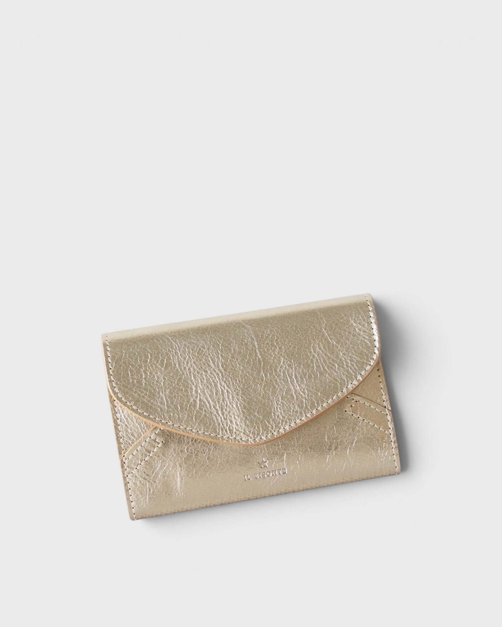 JONES + CO Esperia Medium Wallet in metallic platino leather with snap closure and accordion compartments.