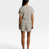 JONES + CO Eve short sleeve shirt and shorts set in natural and chocolate stripe loop terry fabric, back view.