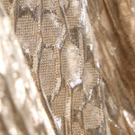 Close-up of JONES + CO Filly Top in champagne shimmery textured Crespi Silk fabric with a metallic weave.