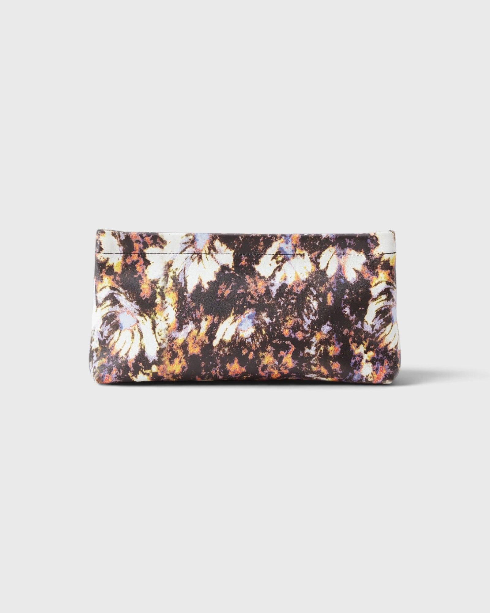 JONES + CO small envelope clutch with a dark watercolor abstract floral print and a secure hinge closure.