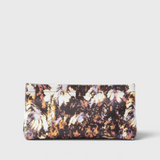 JONES + CO small envelope clutch with a dark watercolor abstract floral print and a secure hinge closure.