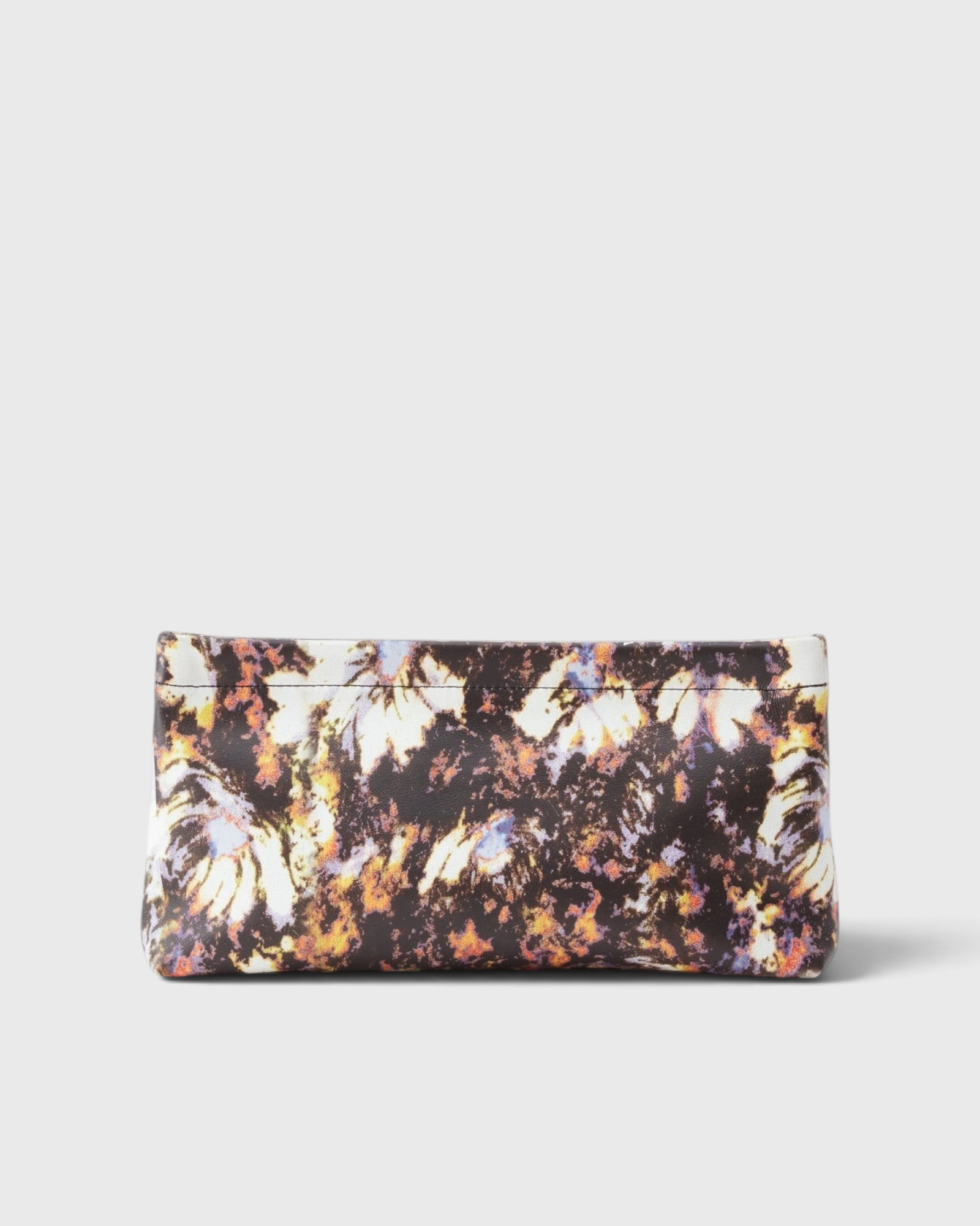 JONES + CO small envelope clutch with a dark watercolor abstract floral print and a secure hinge closure.